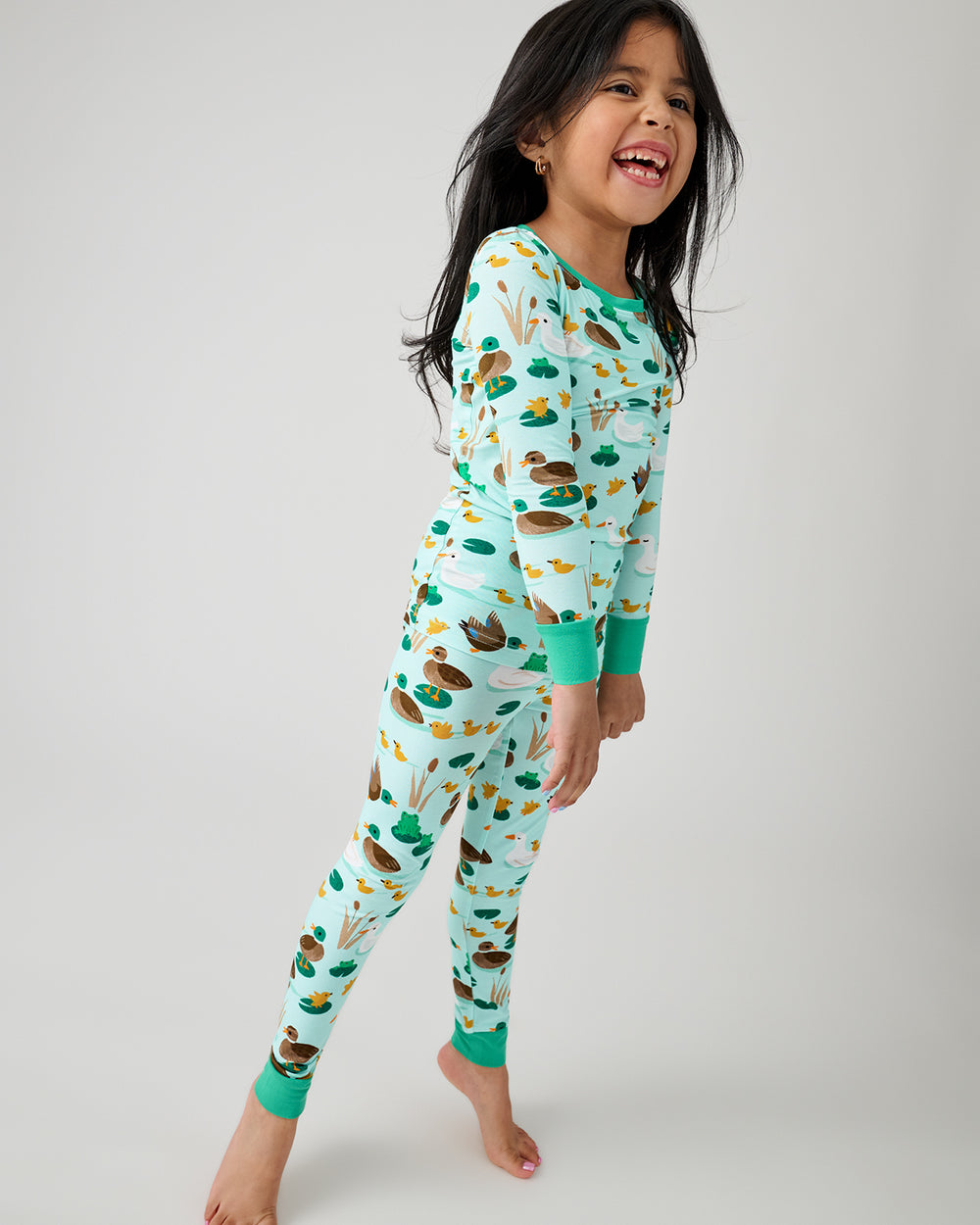 Girl wearing the Puddle Jumpers Two-Piece Pajama Set