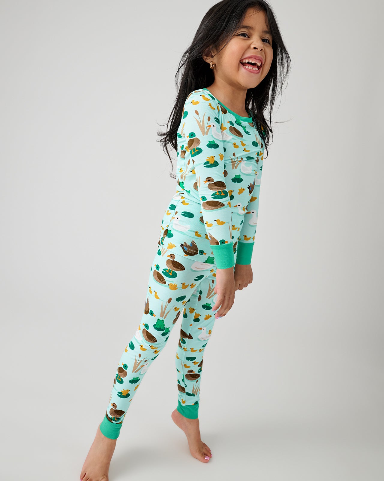 Girl wearing the Puddle Jumpers Two-Piece Pajama Set
