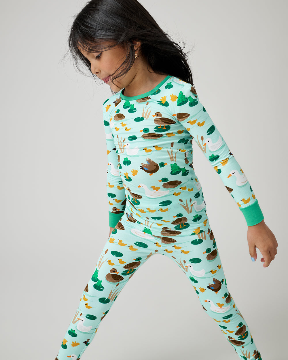 Close up of child wearing the Puddle Jumpers Two-Piece Pajama Set