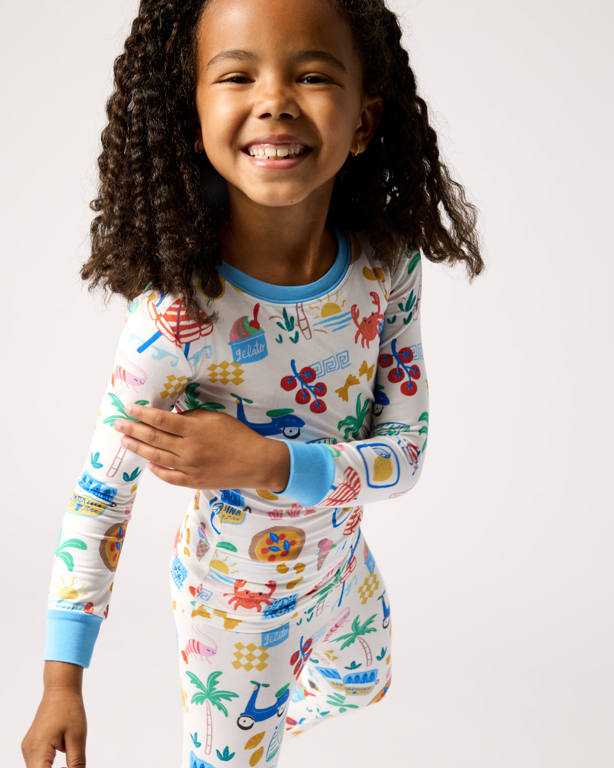 Close up of child wearing the Ciao Bella Two-Piece Pajama Set