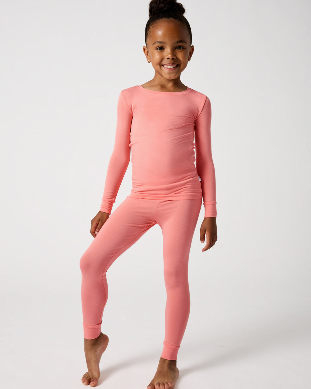 Girl wearing the Sweet Papaya Two-Piece Pajama Set