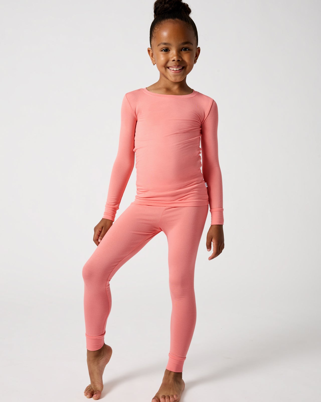 Girl wearing the Sweet Papaya Two-Piece Pajama Set