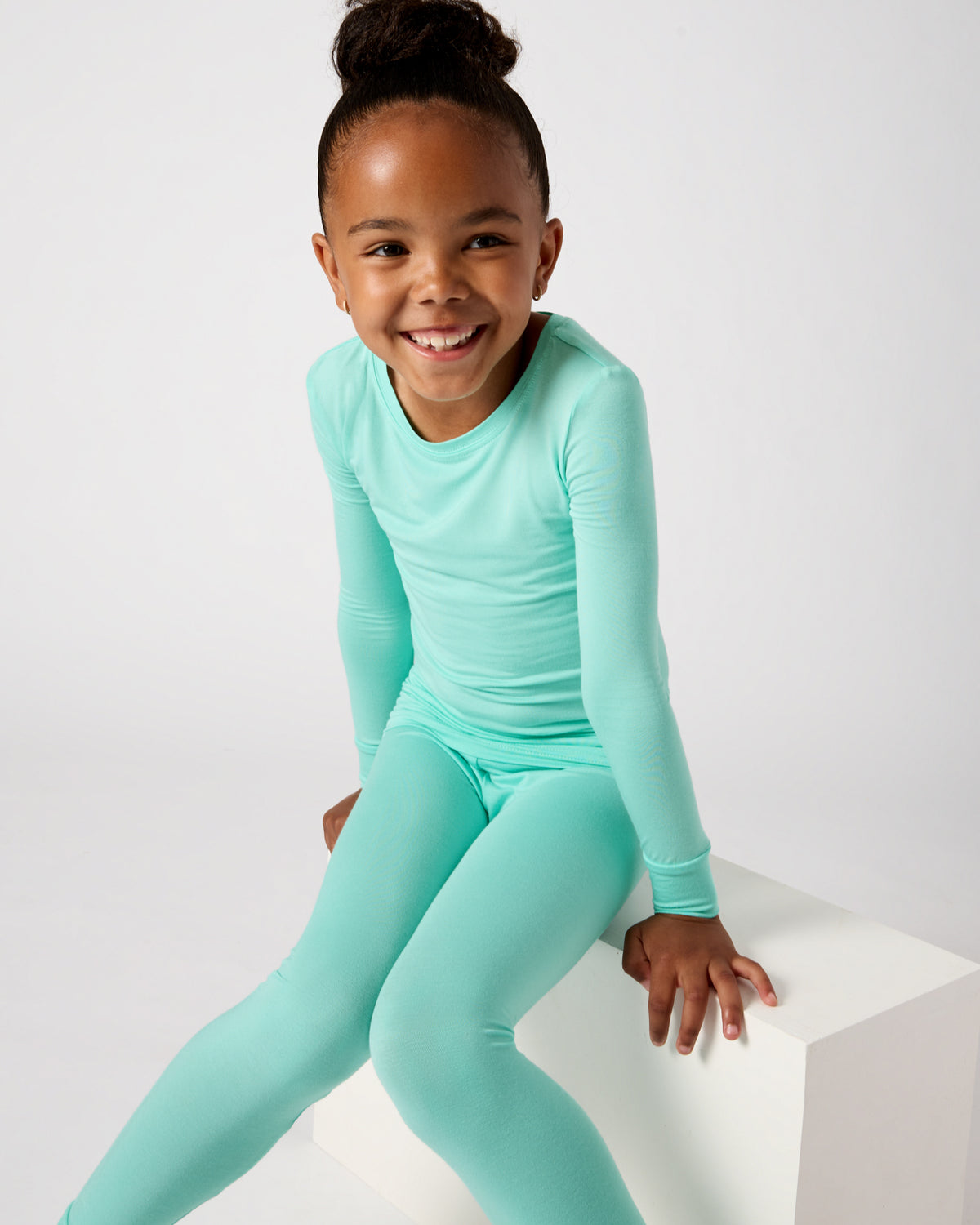 Girl wearing the Ocean Mist Two-Piece Pajama Set