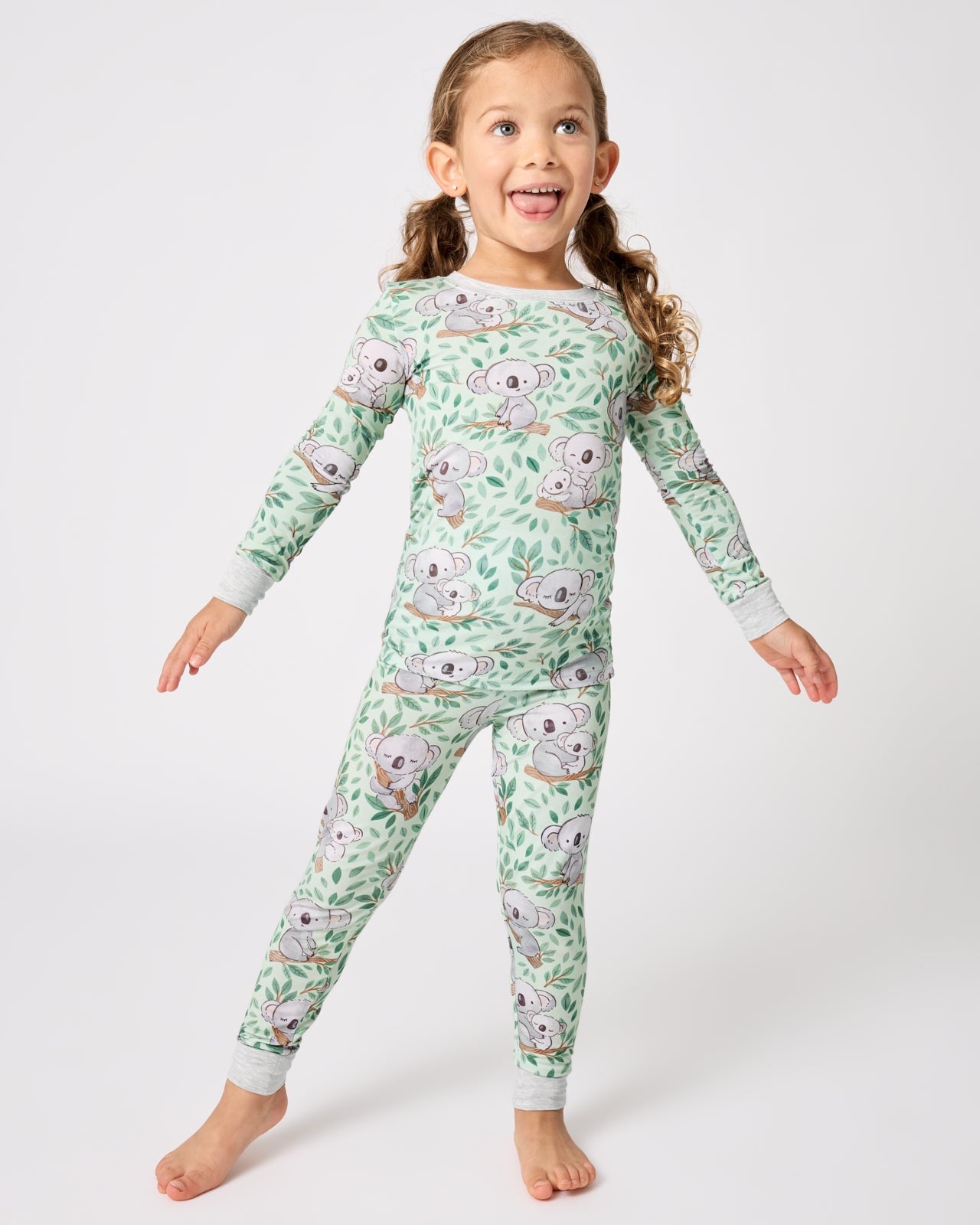 Girl wearing the Koala Cuddles Two-Piece Pajama Set
