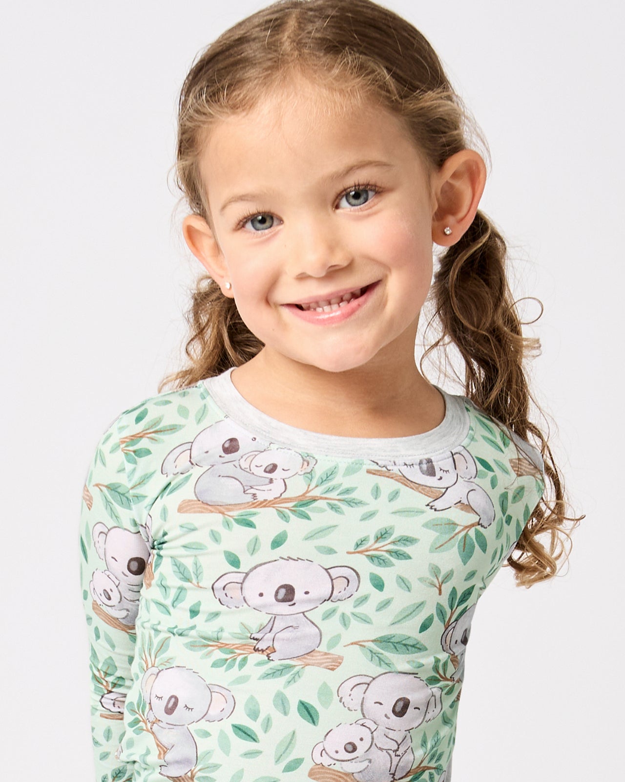 Close up of girl wearing the Koala Cuddles Two-Piece Pajama Set