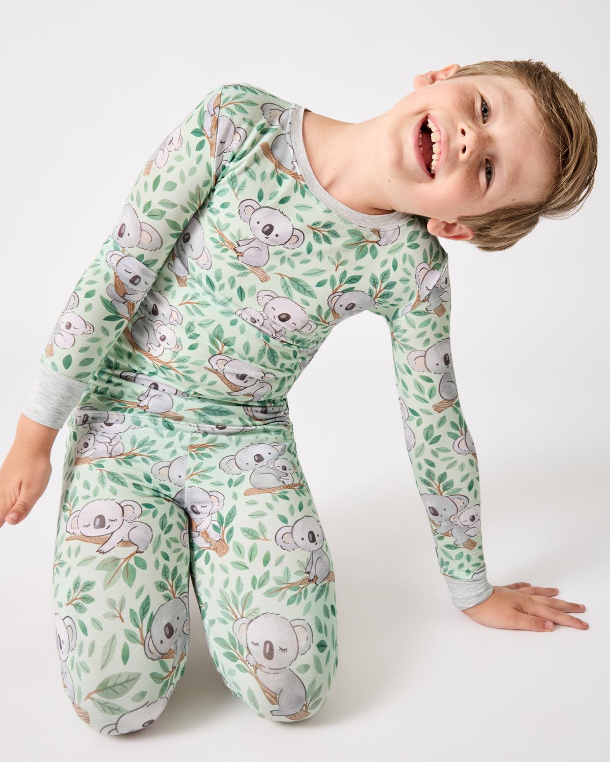 Boy wearing the Koala Cuddles Two-Piece Pajama Set