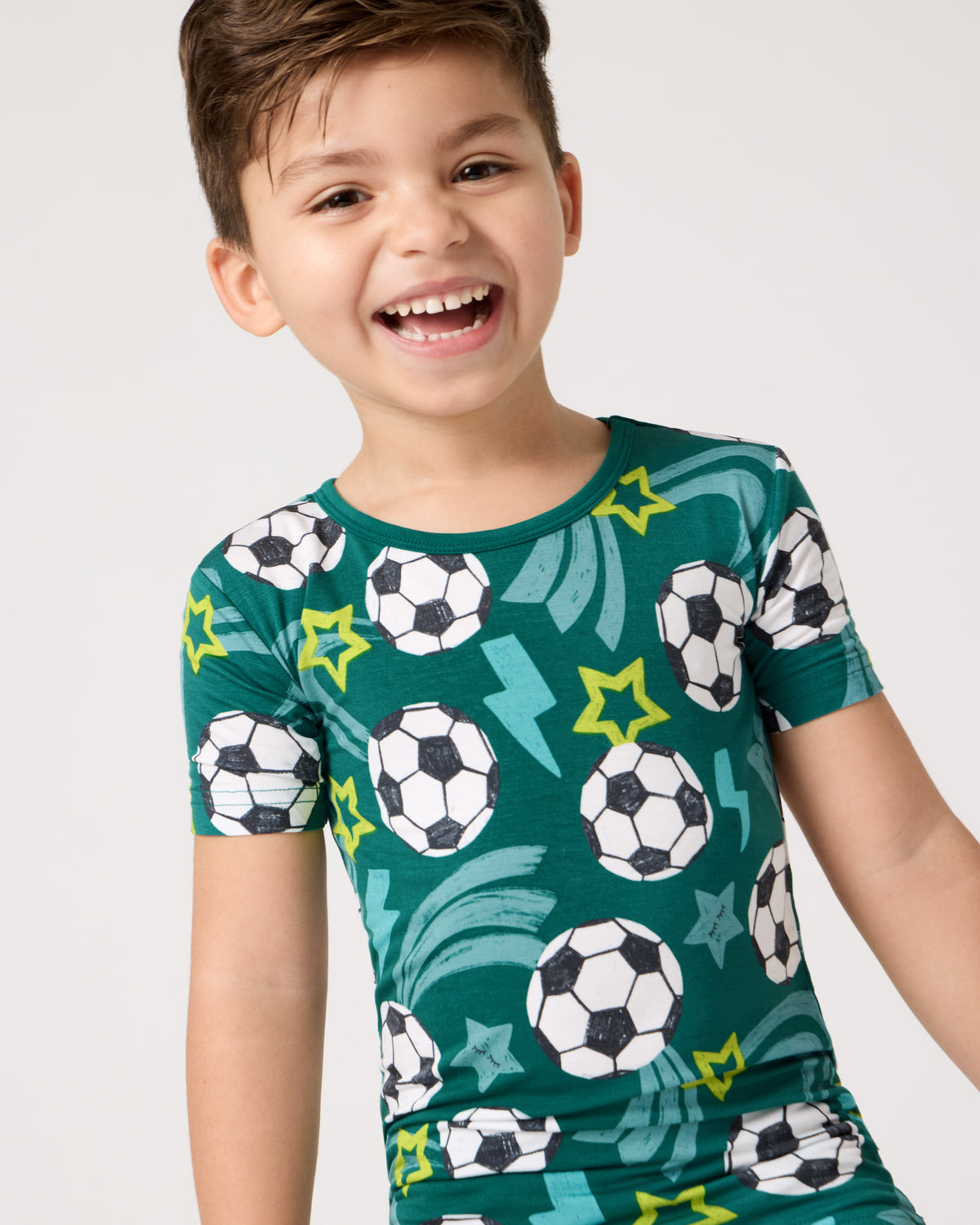 Alternate close up of child wearing the Soccer Stars Two-Piece Short Sleeve & Shorts Pajama Set