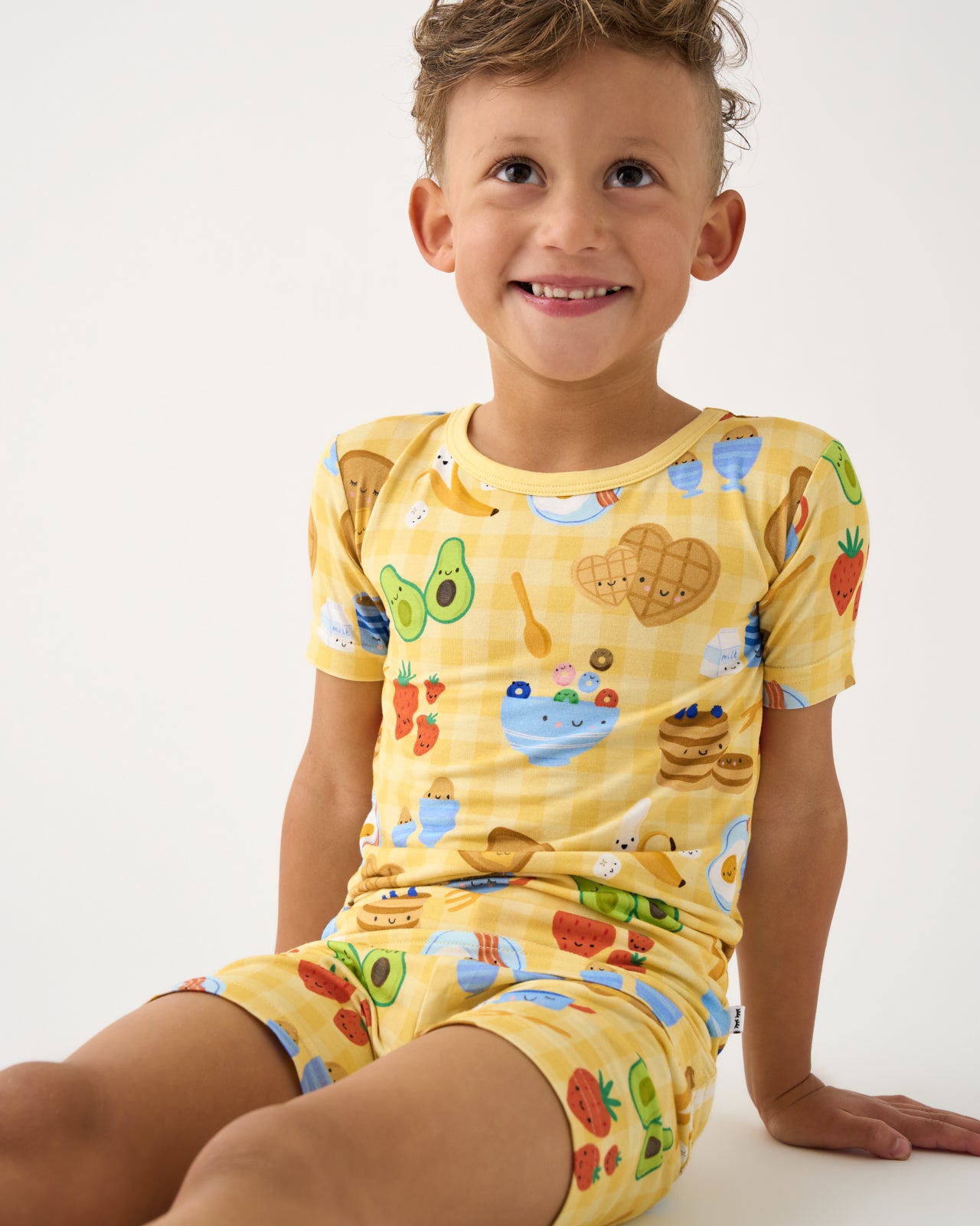 Alternate of sitting boy wearing the Breakfast Bunch Two-Piece Short Sleeve & Shorts Pajama Set