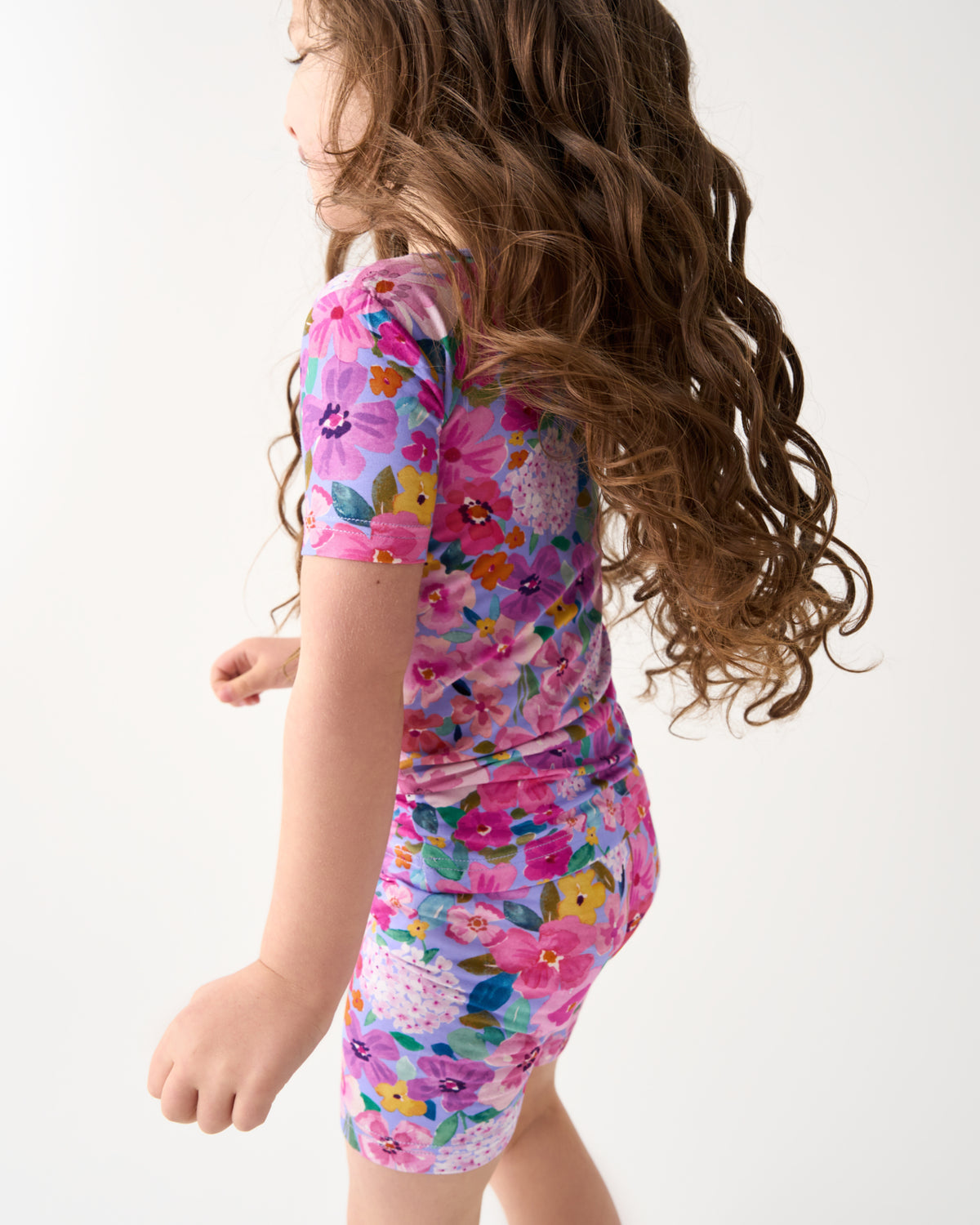 Back view of child wearing the Sweet Sprigs Two-Piece Short Sleeve & Shorts Pajama Set