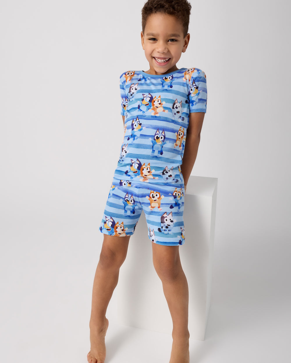 Boy weraing the Bluey Dance All Day Two-Piece Short Sleeve & Shorts Bamboo Pajama Set