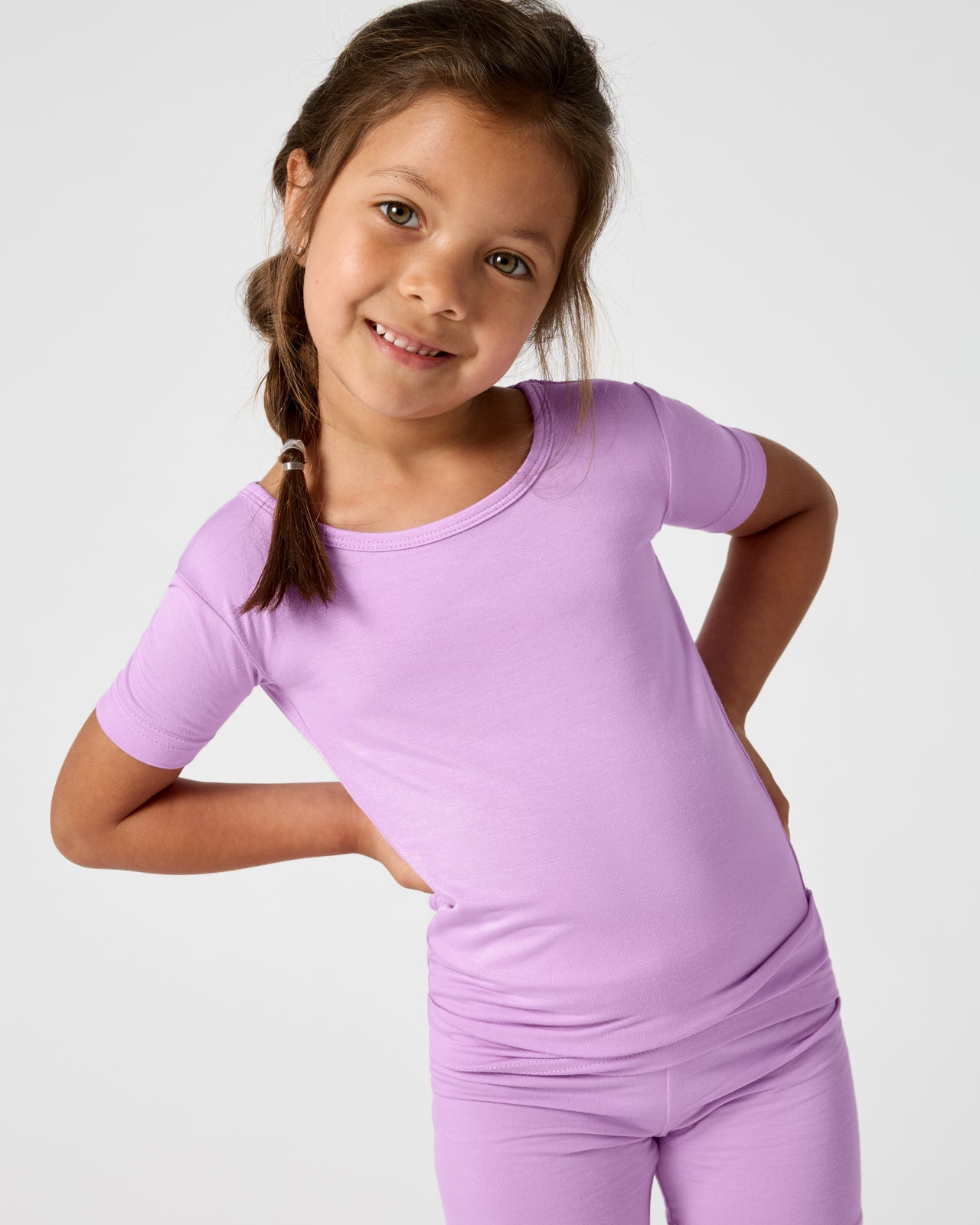 Close up of girl wearing the Soft Wisteria Two-Piece Short Sleeve & Shorts Pajama Set
