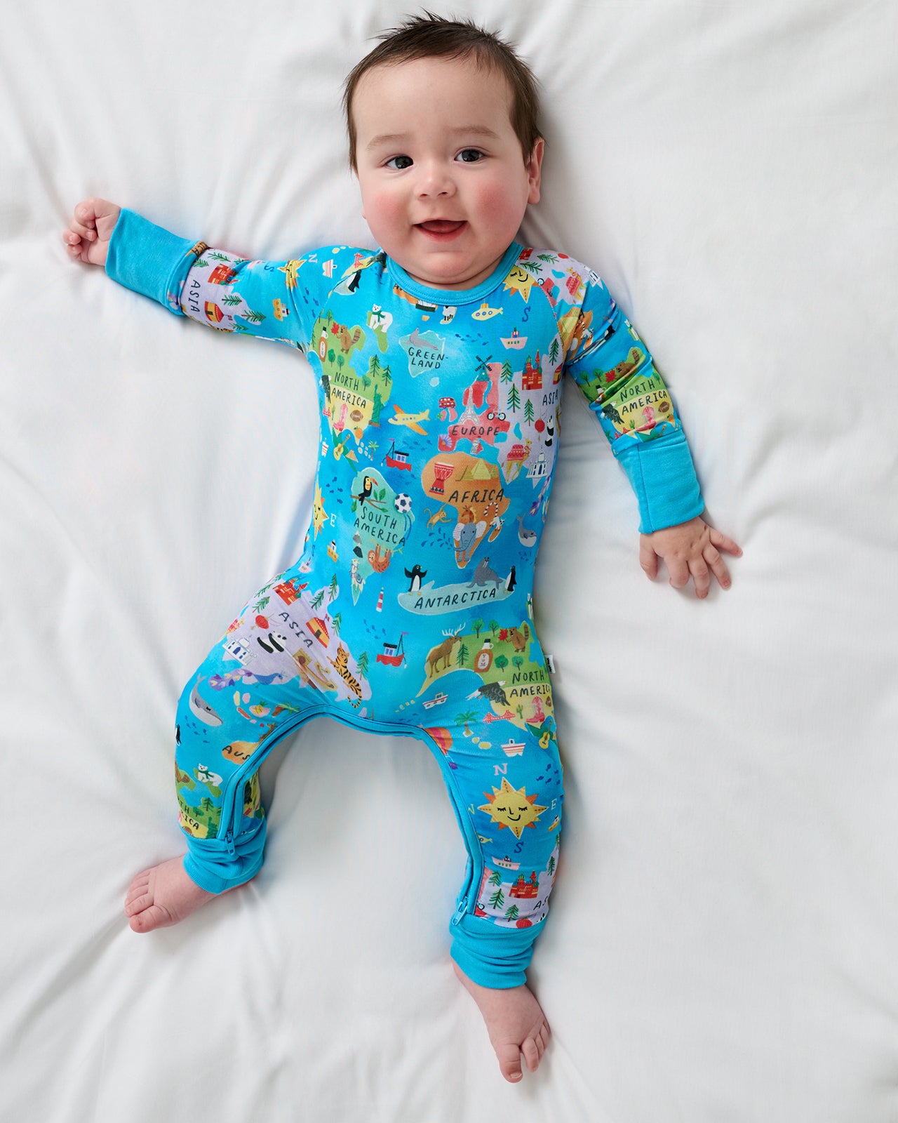 Aerial view of baby wearing the Around The World Crescent Zippy