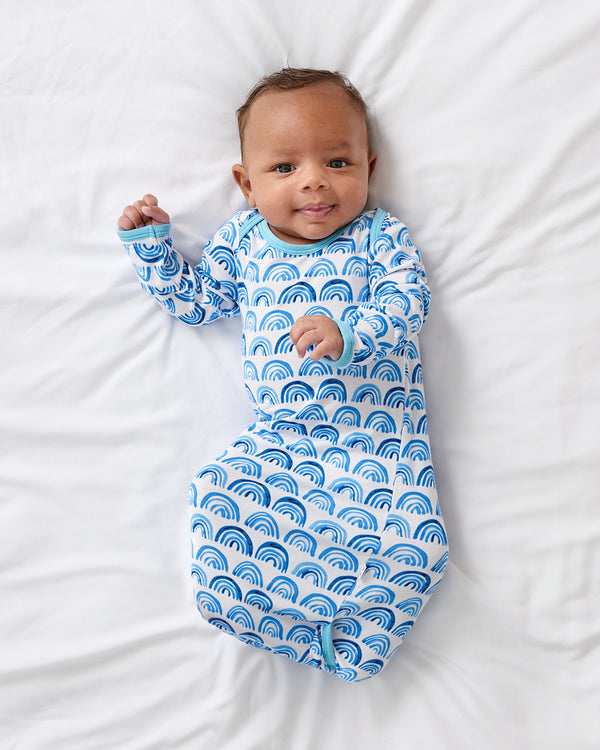 Aerial view of baby boy in the Blue Rainbows Infant Gown