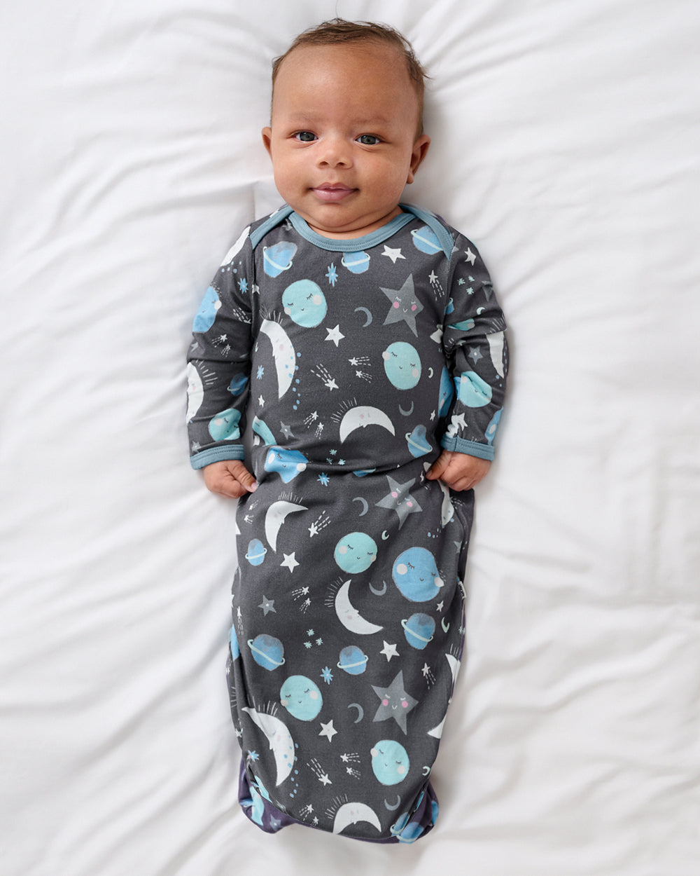 Newborn baby boy wearing the Blue To the Moon & Back Infant Gown