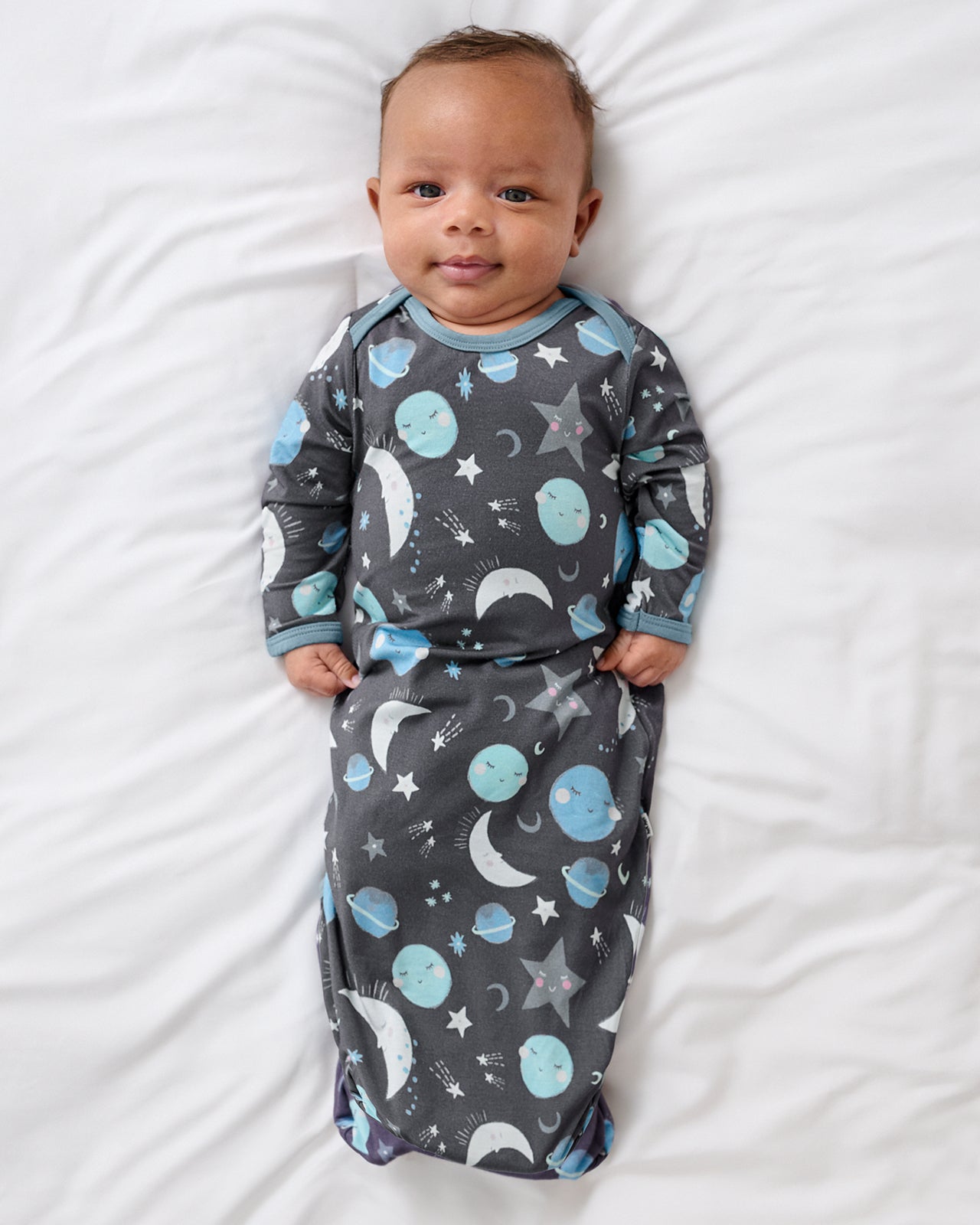 Newborn baby boy wearing the Blue To the Moon & Back Infant Gown