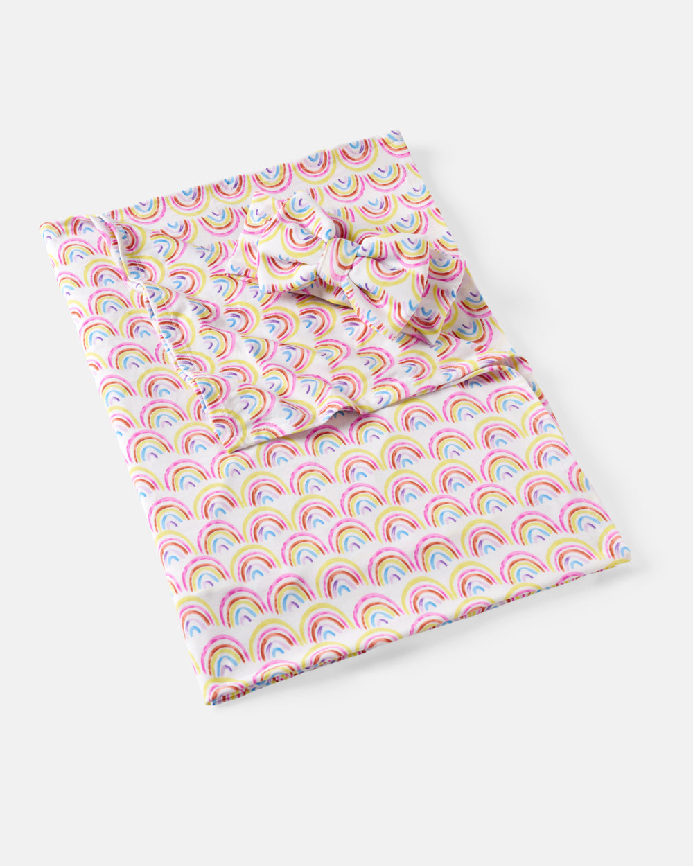 Flat lay of the Pastel Rainbows Swaddle & Luxe Bow Headband Set