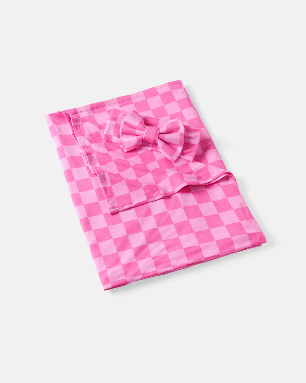 Flat lay of the Sweet Raspberry Checks Swaddle & Luxe Bow Headband Set