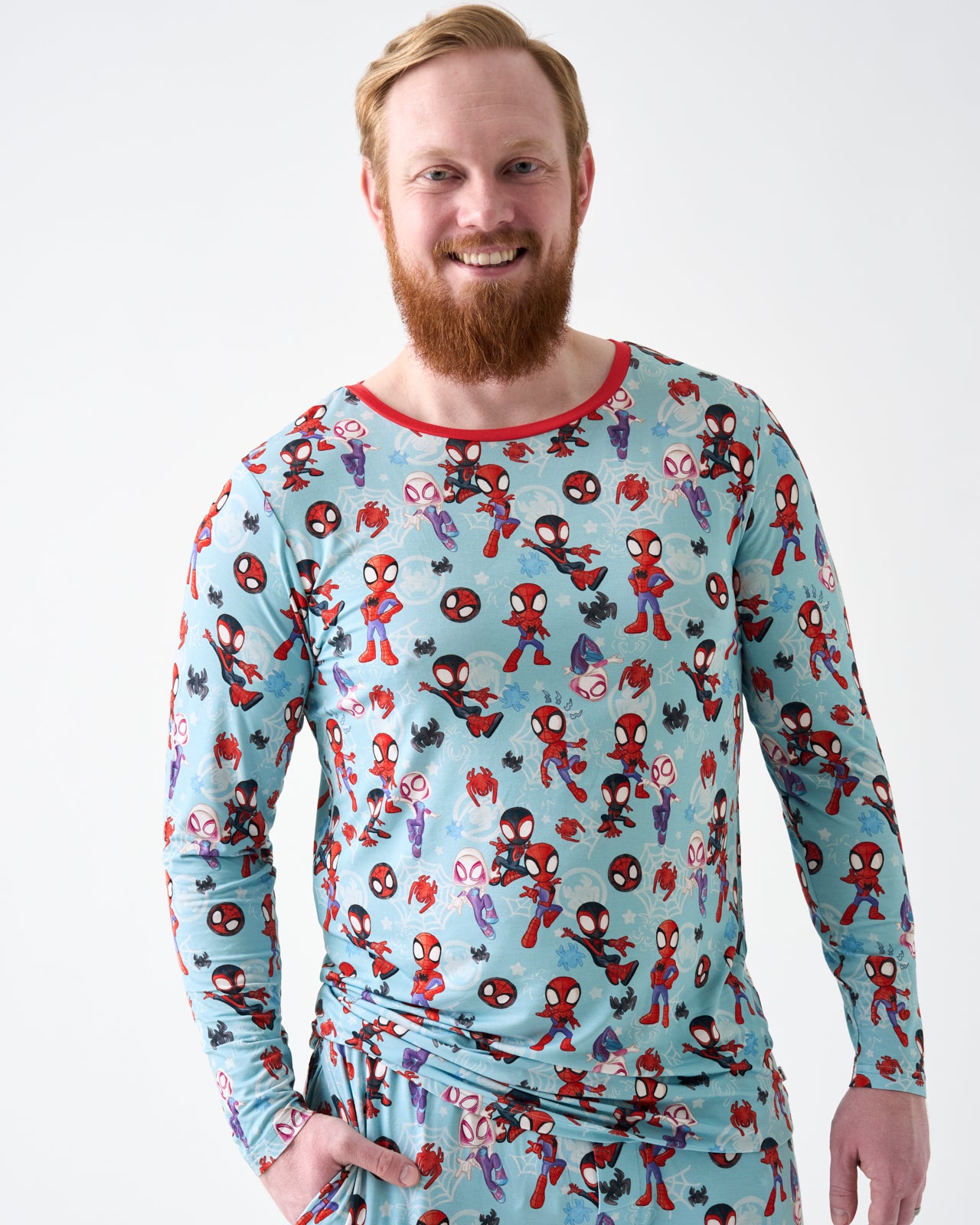 Man wearing the Spidey & Friends Tiny Webs Men's Long Sleeve Pajama Top