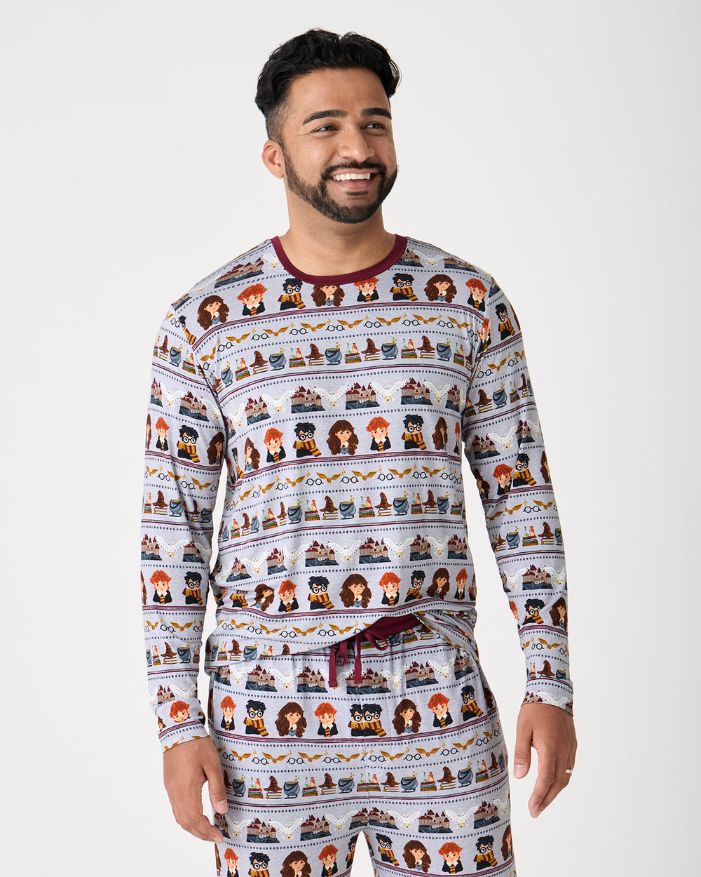 Man wearing the Harry Potter™ Spellbinding Studies Men's Long Sleeve Pajama Top