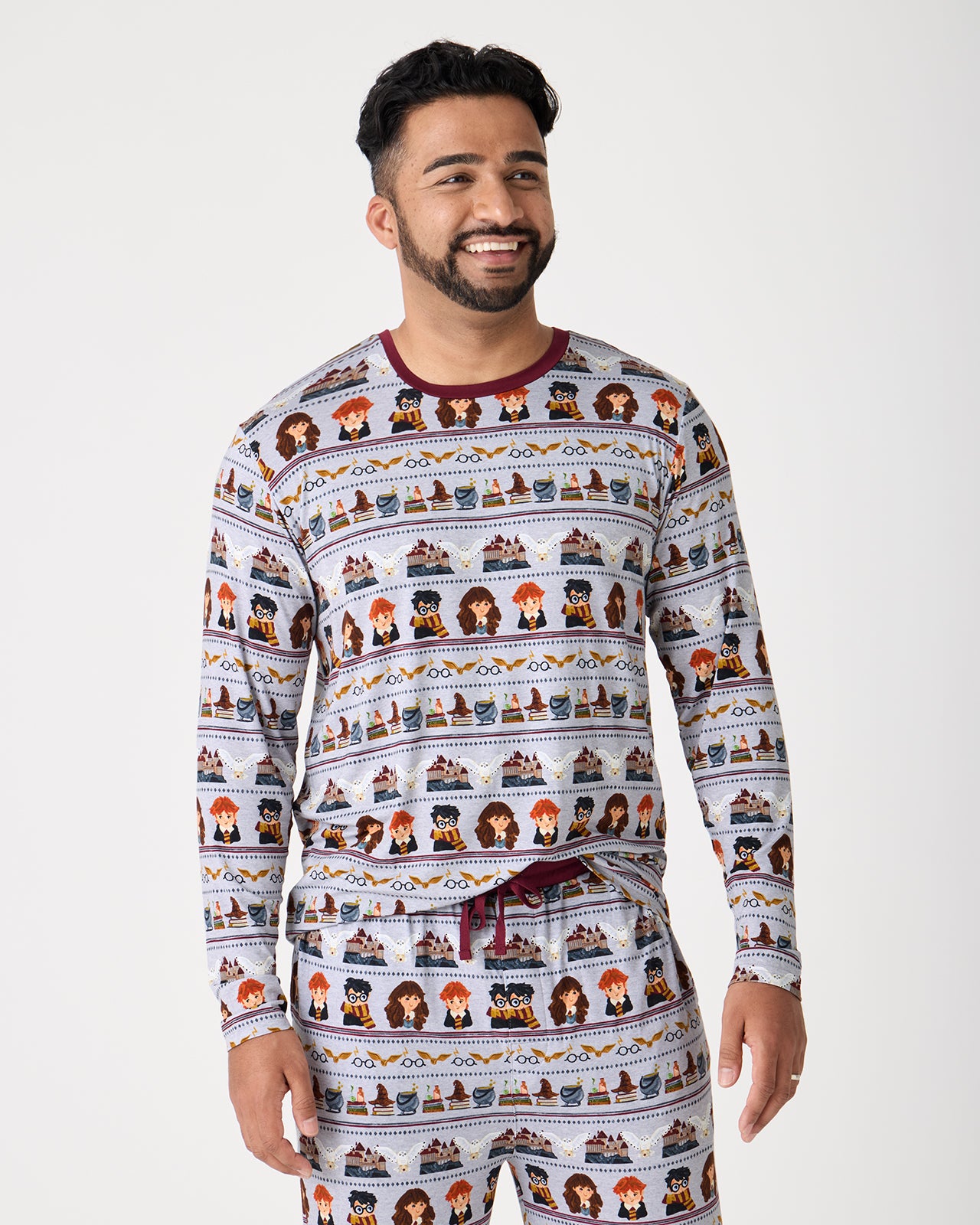 Man wearing the Harry Potter™ Spellbinding Studies Men's Long Sleeve Pajama Top