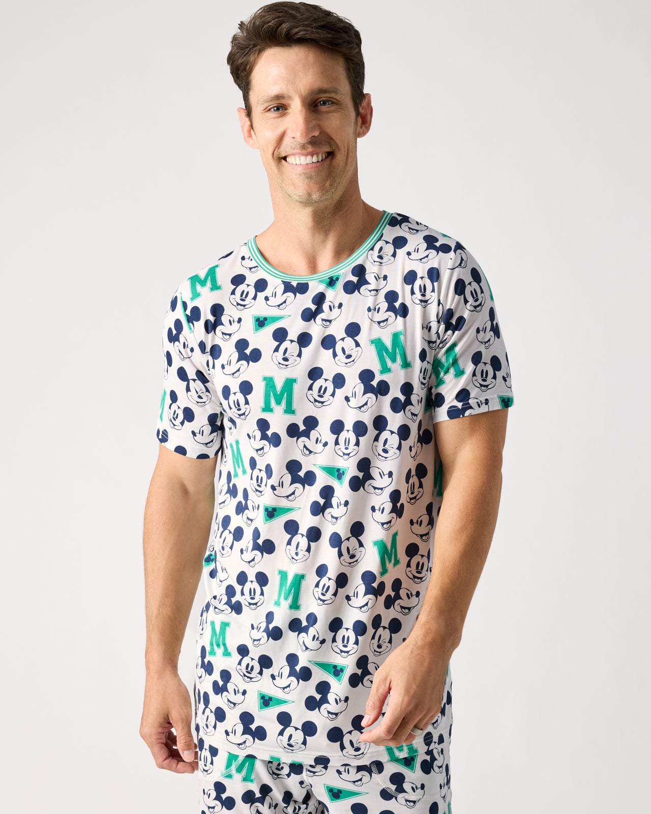 Man wearing the Disney Varsity Mickey Mouse Men's Short Sleeve Pajama Top