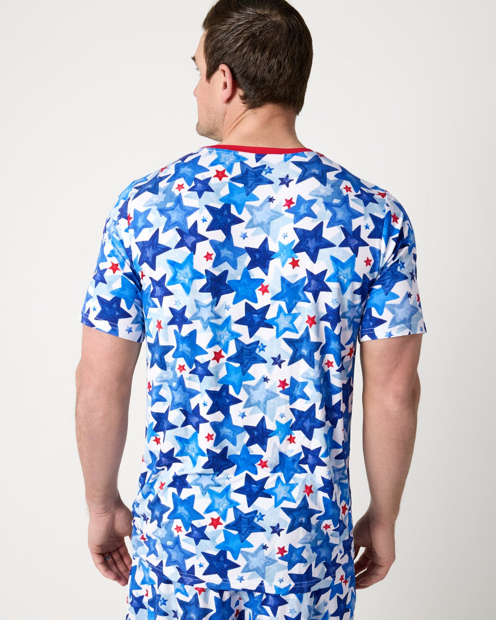 Back view of man wearing the Starry Splash Men's Short Sleeve Pajama Top and Shorts