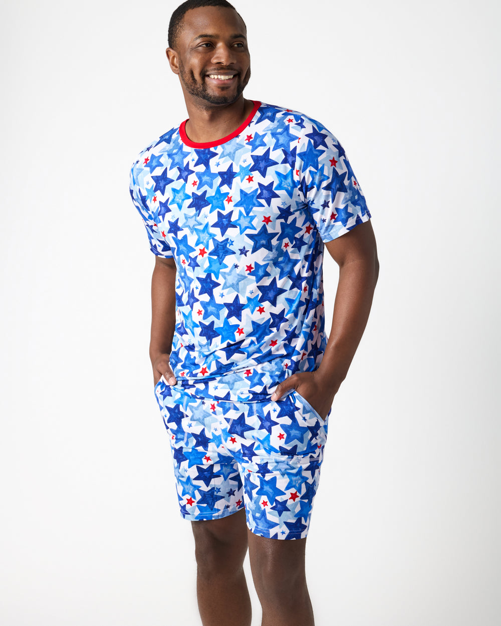 Man wearing the Starry Splash Men's Pajama Shorts and Top