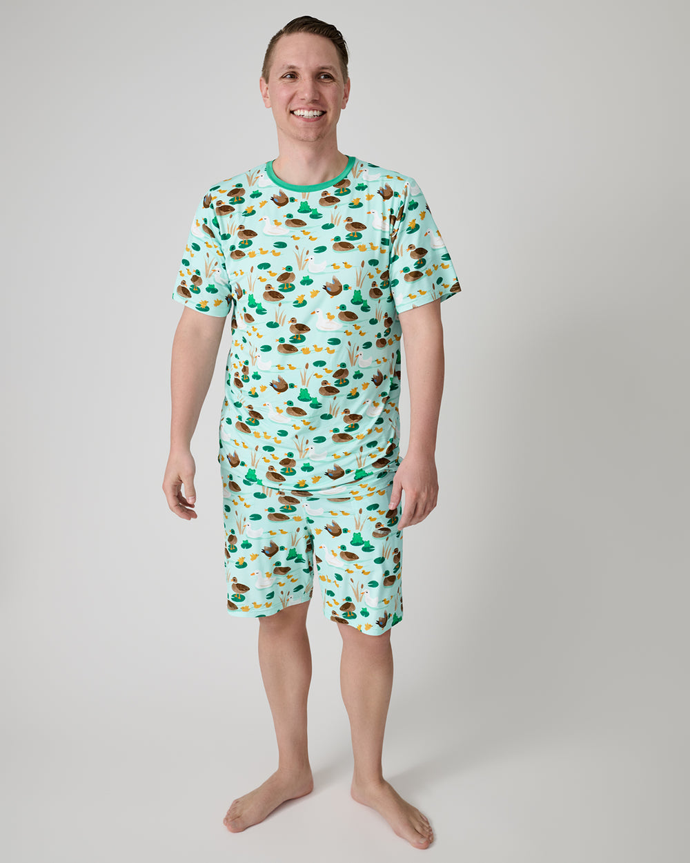 Man wearing the Puddle Jumpers Men's Pajama Shorts and Top