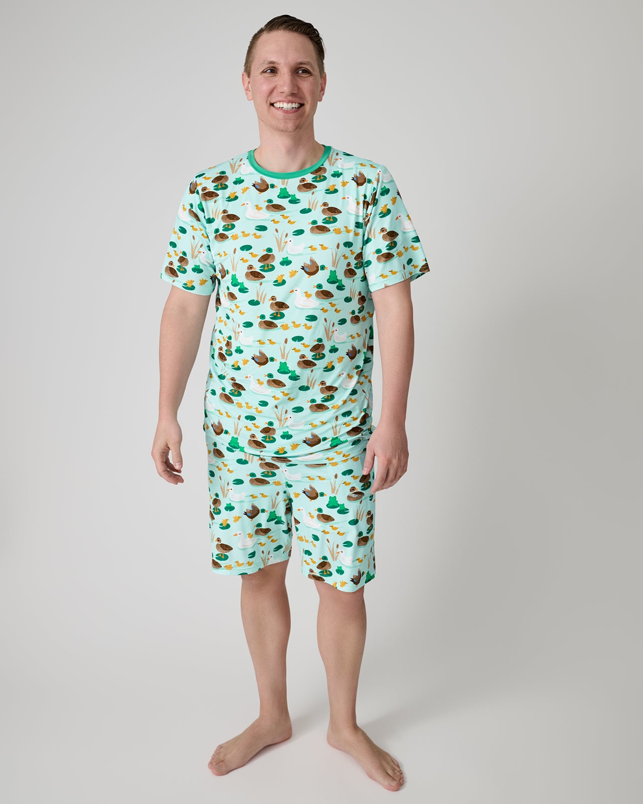 Man wearing the Puddle Jumpers Men's Pajama Shorts and Top