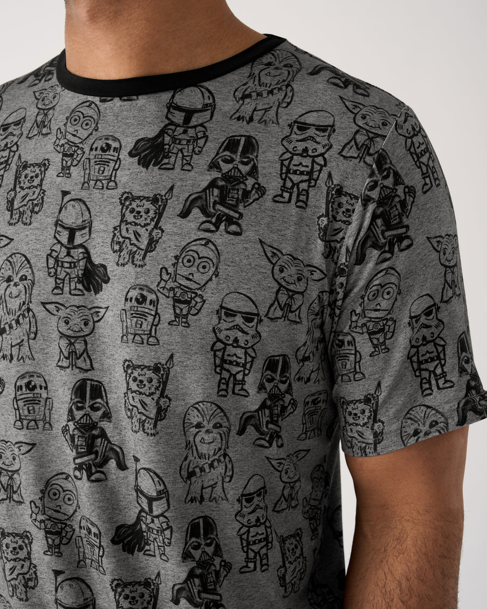 Close up of man wearing the Star Wars Far, Far, Away Friends Men's Short Sleeve Pajama Top