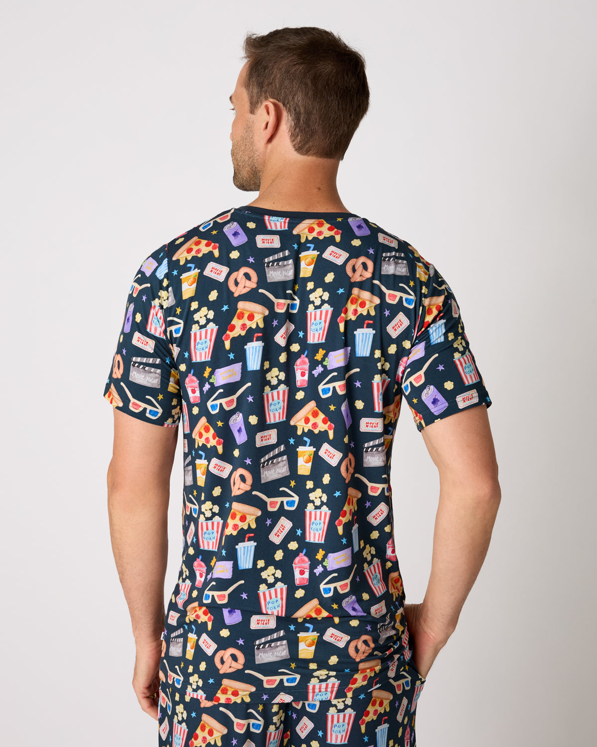 Back view of man wearing the Movie Marathon Men's Short Sleeve Pajama Top