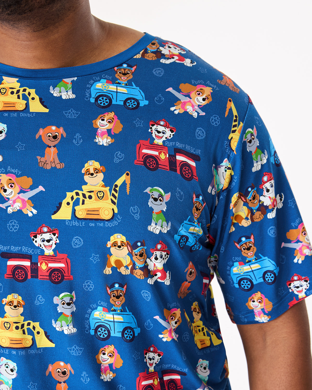 Close up of man wearing the PAW Patrol Adventure Bay Heroes Men's Short Sleeve Pajama Top