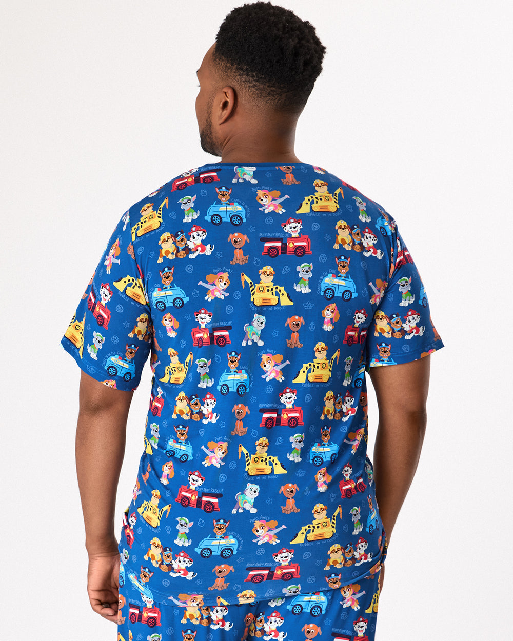Back view of man wearing the PAW Patrol Adventure Bay Heroes Men's Short Sleeve Pajama Top