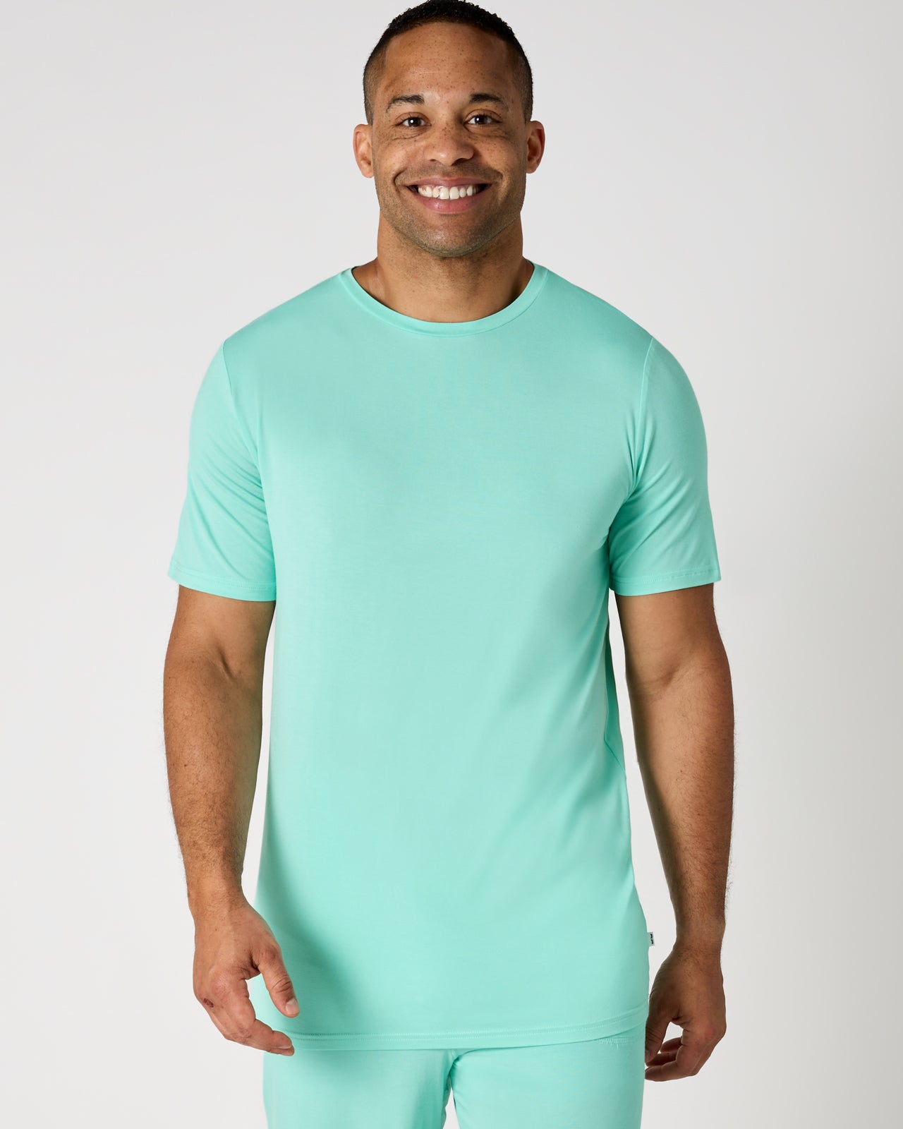 Man wearing the Ocean Mist Men's Short Sleeve Pajama Top