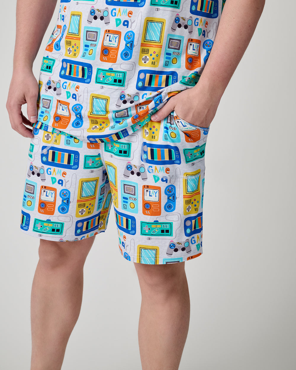 Close up of man wearing the Game On Men's Pajama Shorts