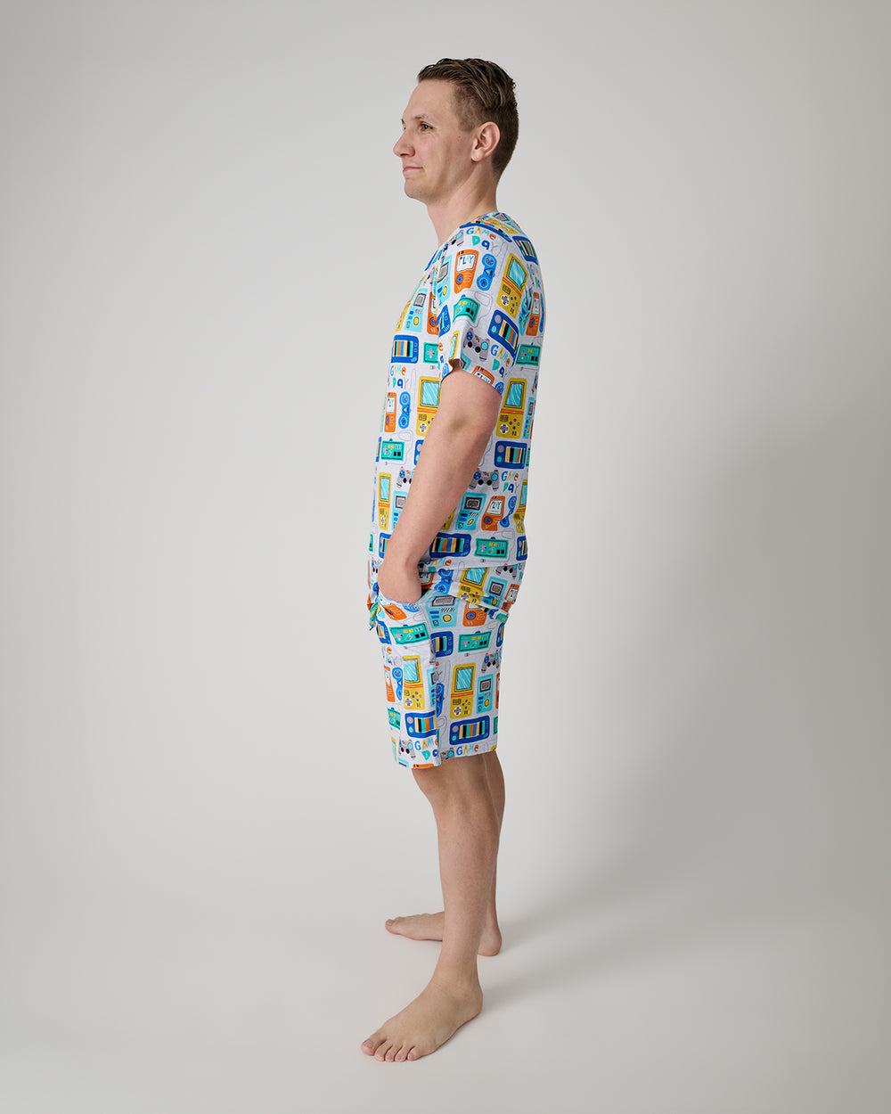 Side view of man wearing the Game On Men's Pajama Shorts and Top