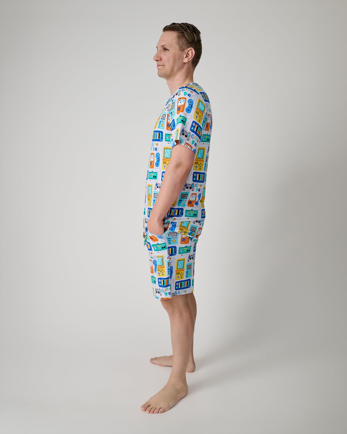 Side view of man wearing the Game On Men's Pajama Shorts and Top