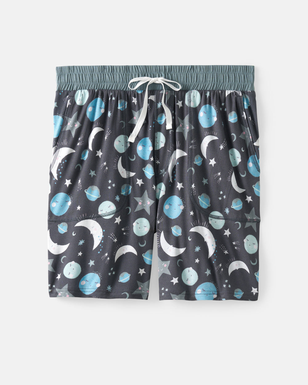 A pair of dark gray drawstring shorts with an all-over space print featuring blue planets, white crescent moons, and white stars, displayed flat against a light gray background.