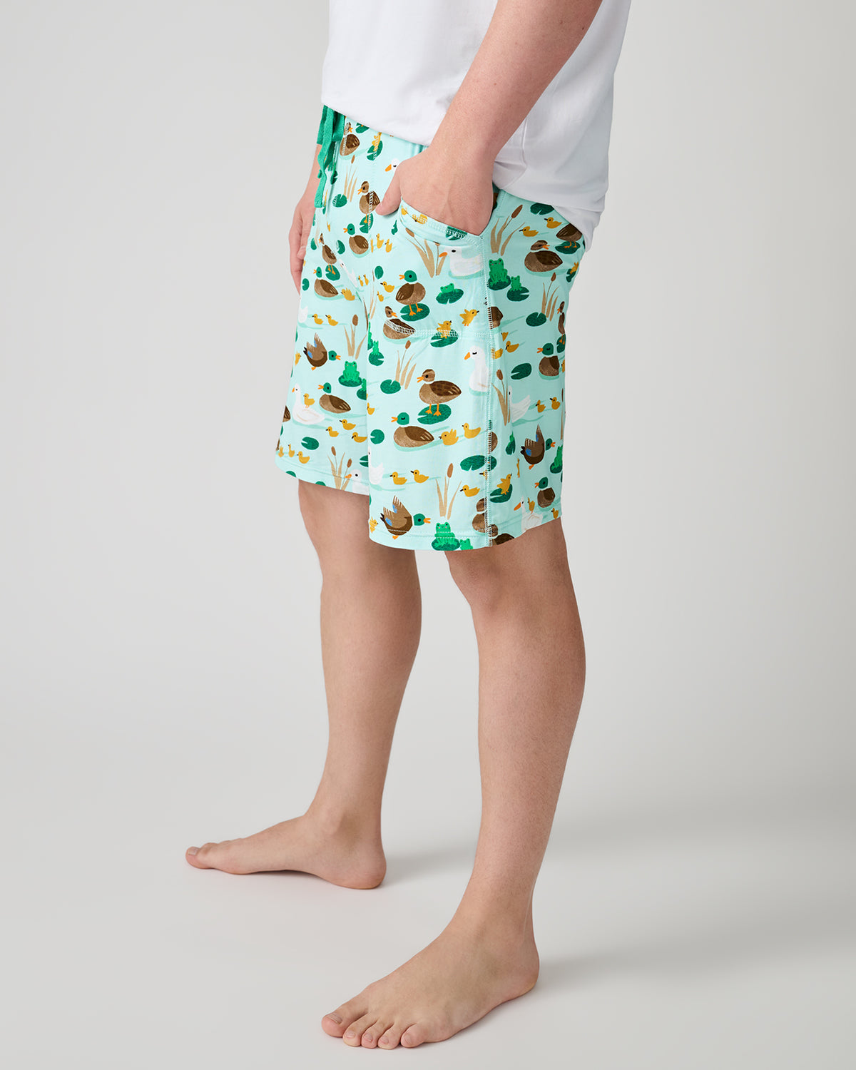 Man wearing the Puddle Jumpers Men's Pajama Shorts with his hand in the pocket