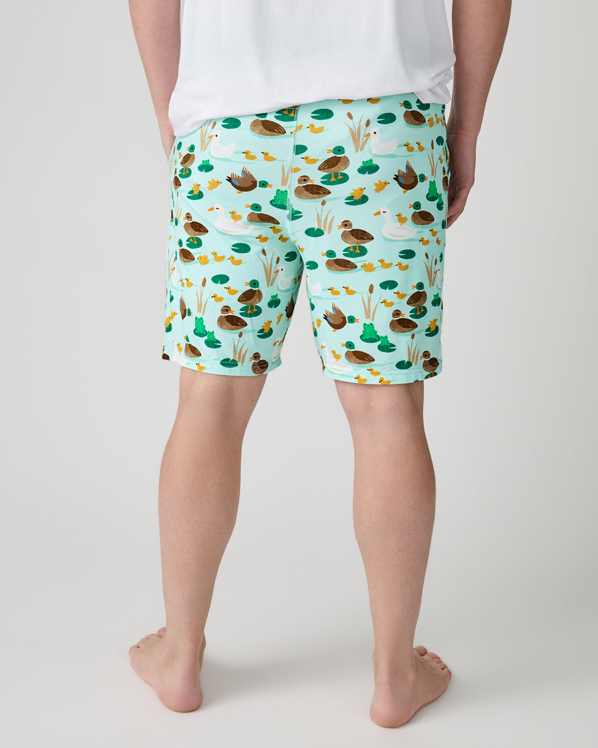 Back view of man wearing the Puddle Jumpers Men's Pajama Shorts