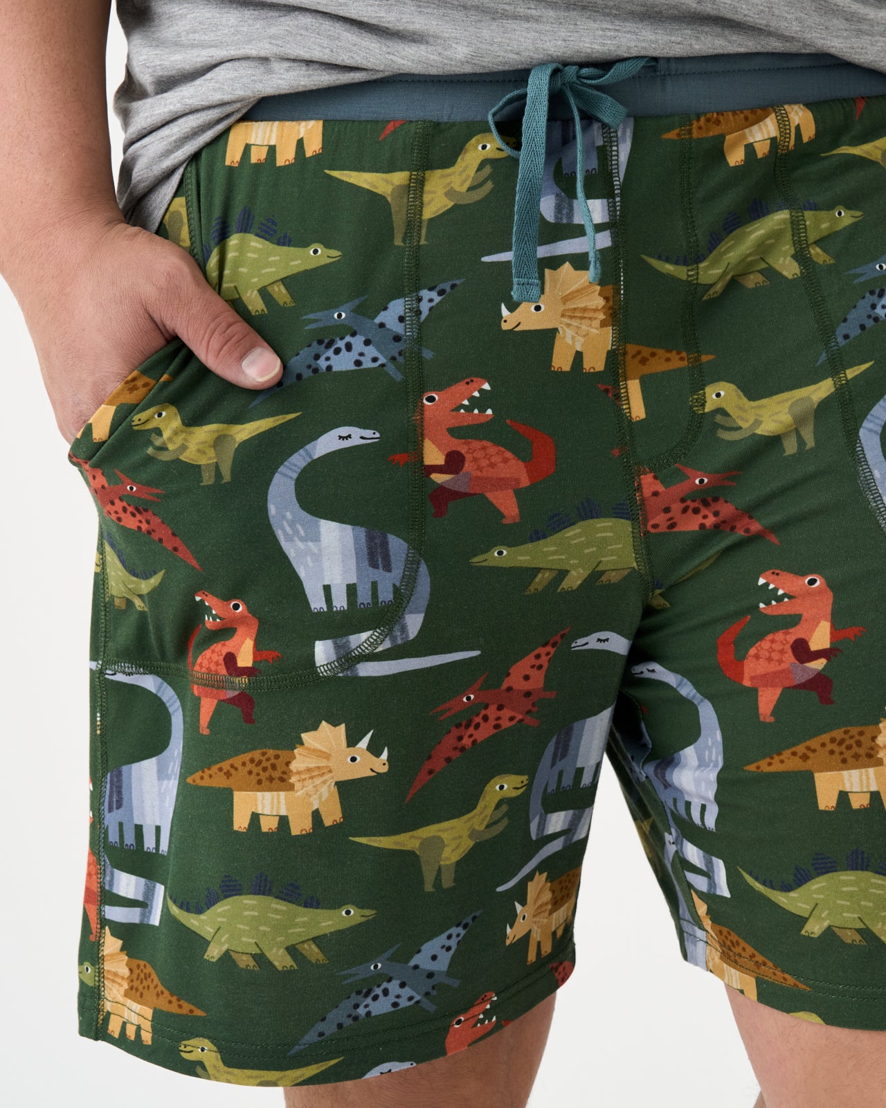 Close up of man wearing the Green Roar & Explore Men's Pajama Shorts