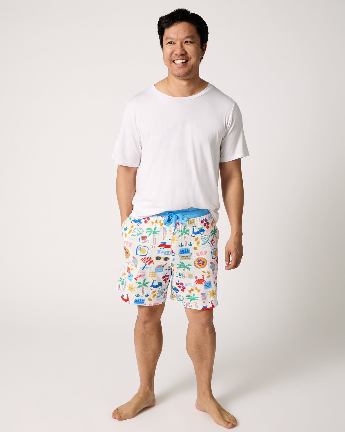 Man wearing the Ciao Bella Men's Pajama Shorts with a white PJ top