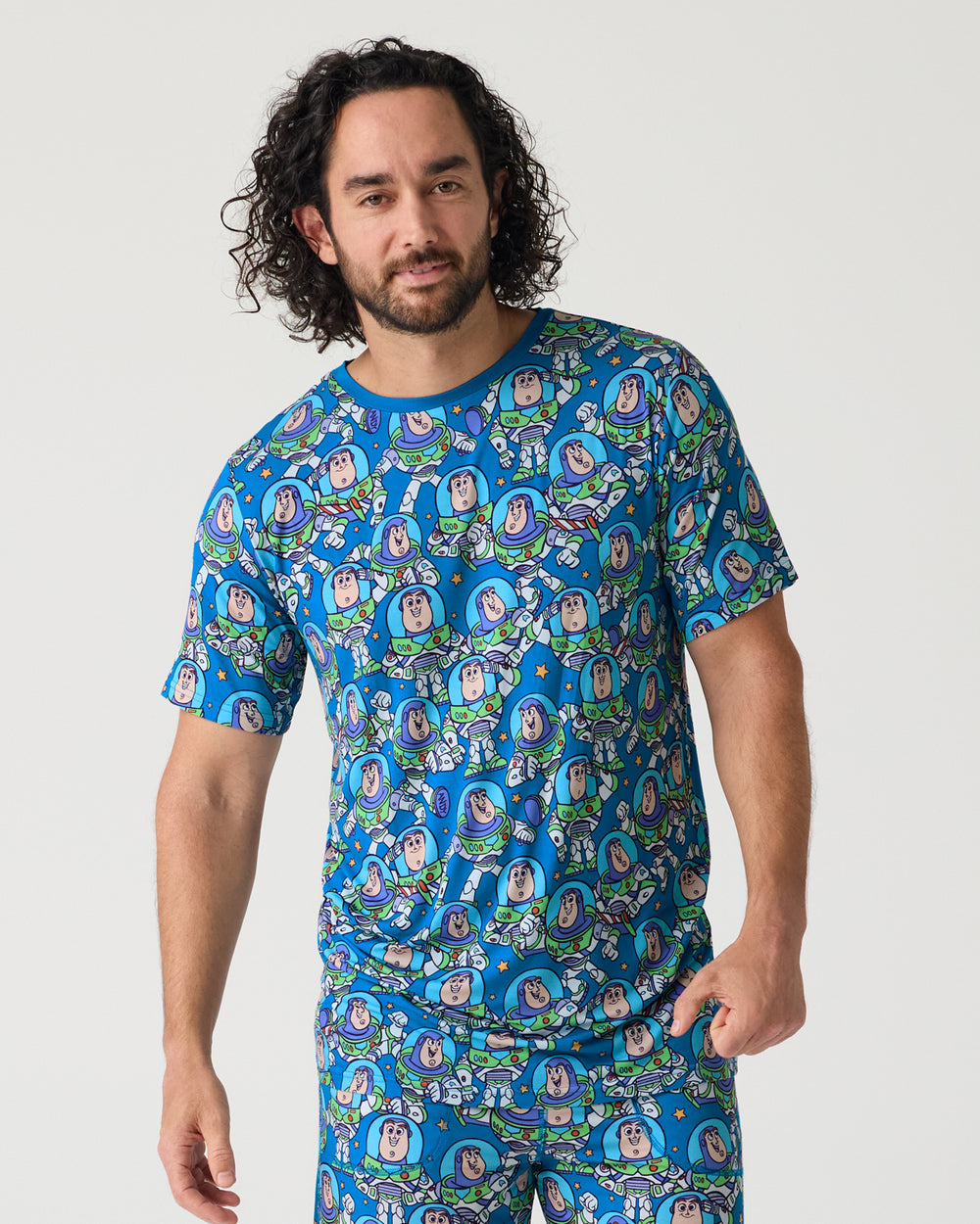 Man wearing the Disney & Pixar Buzz's Cosmic Crew Men's Short Sleeve Pajama Top