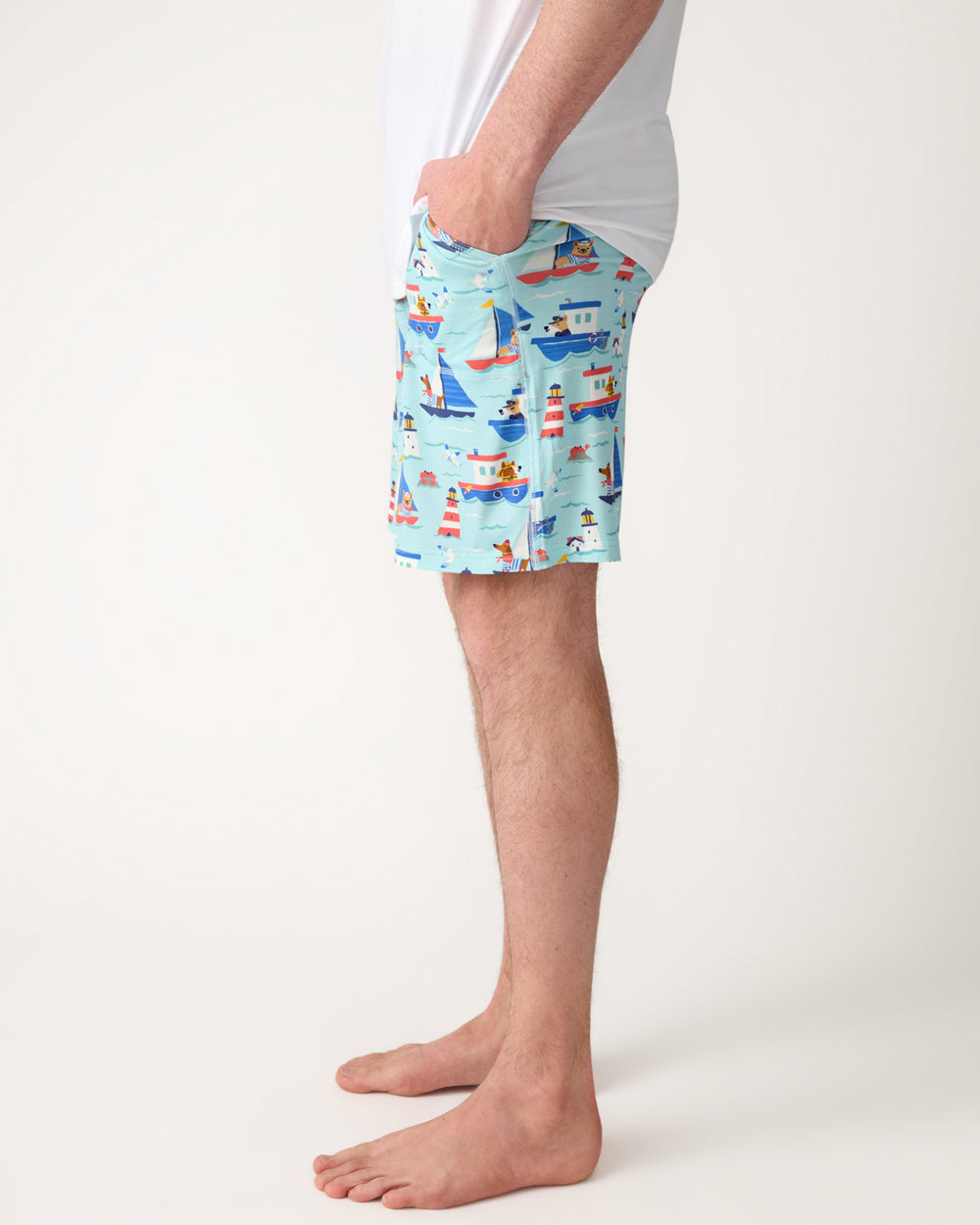 Side view of man wearing the Nautical Paws Men's Pajama Shorts
