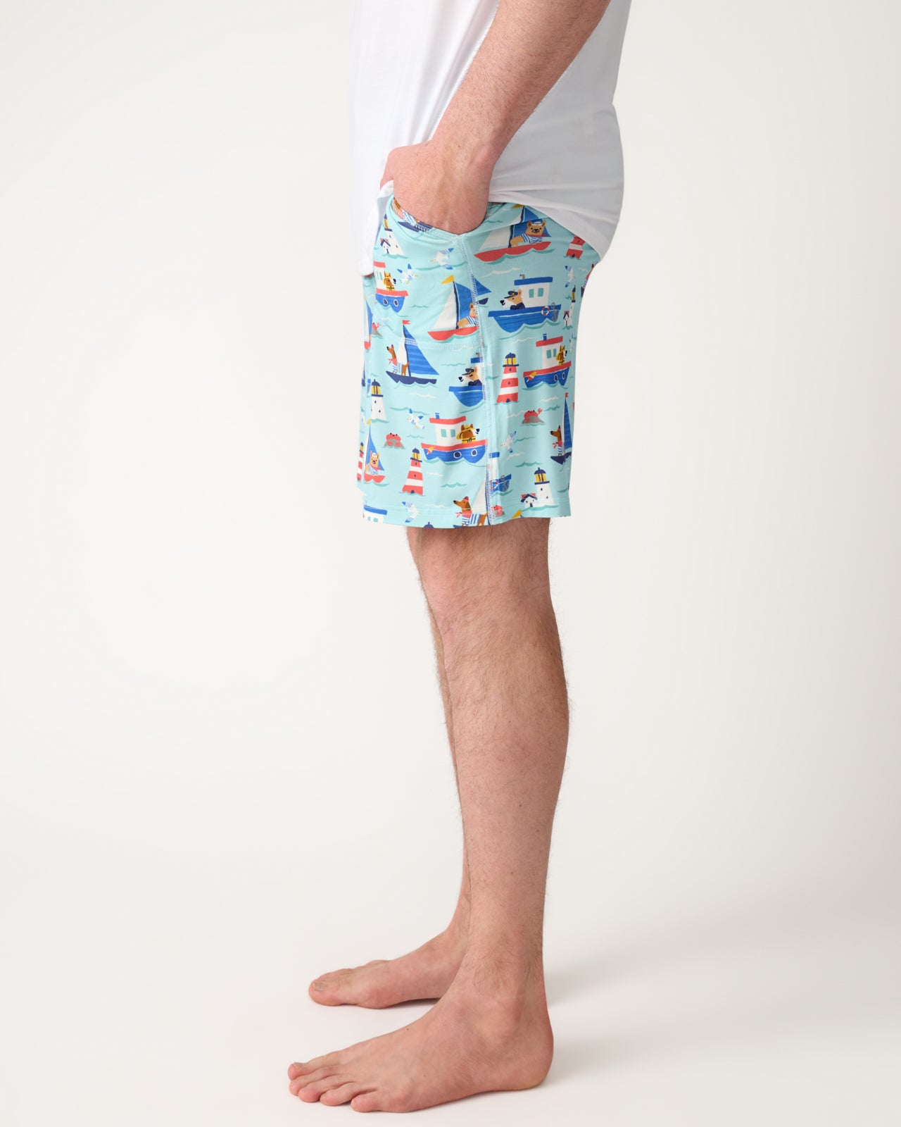 Side view of man wearing the Nautical Paws Men's Pajama Shorts