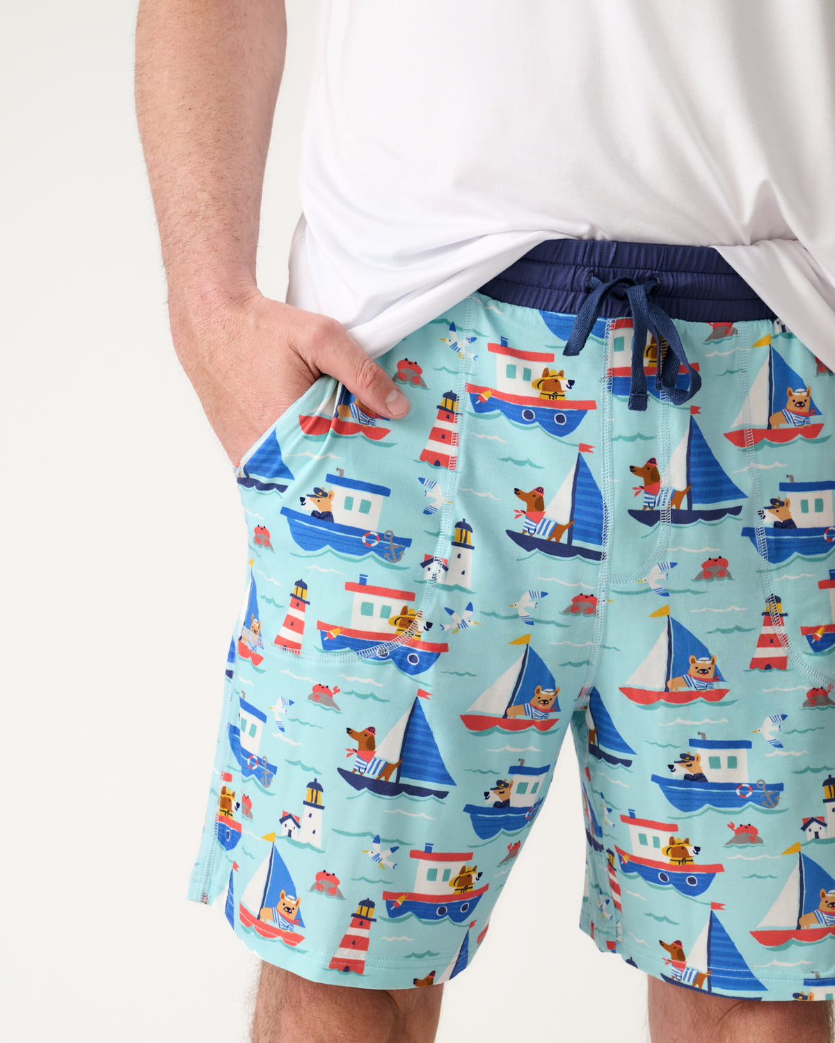 Close up of man wearing the Nautical Paws Men's Pajama Shorts