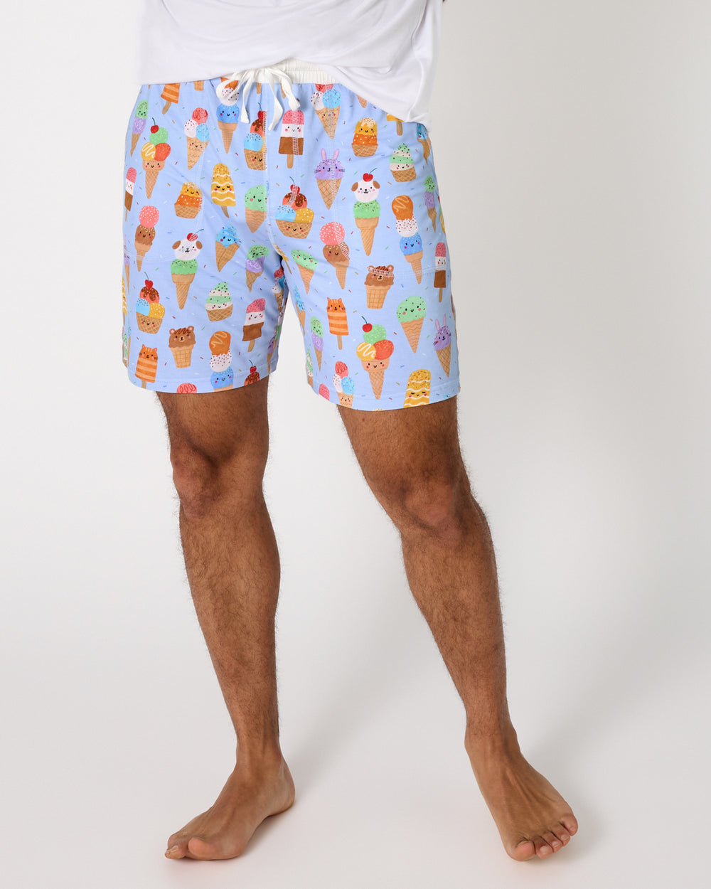 Man wearing the Scoop Squad Men's Pajama Shorts