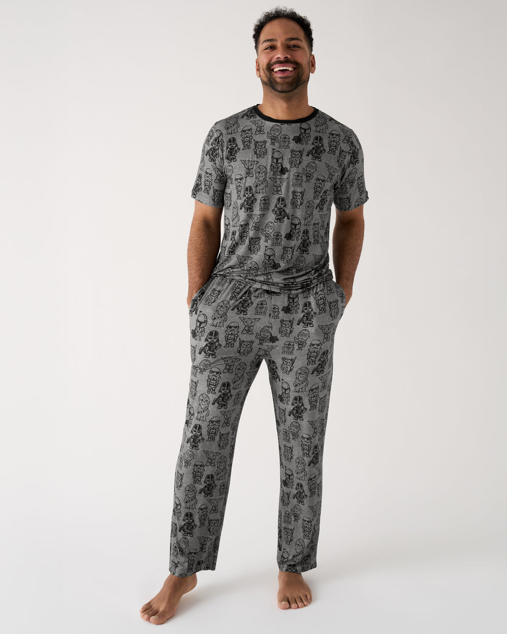 Man wearing the Star Wars Far, Far, Away Friends Men's Pajama Pants and Top