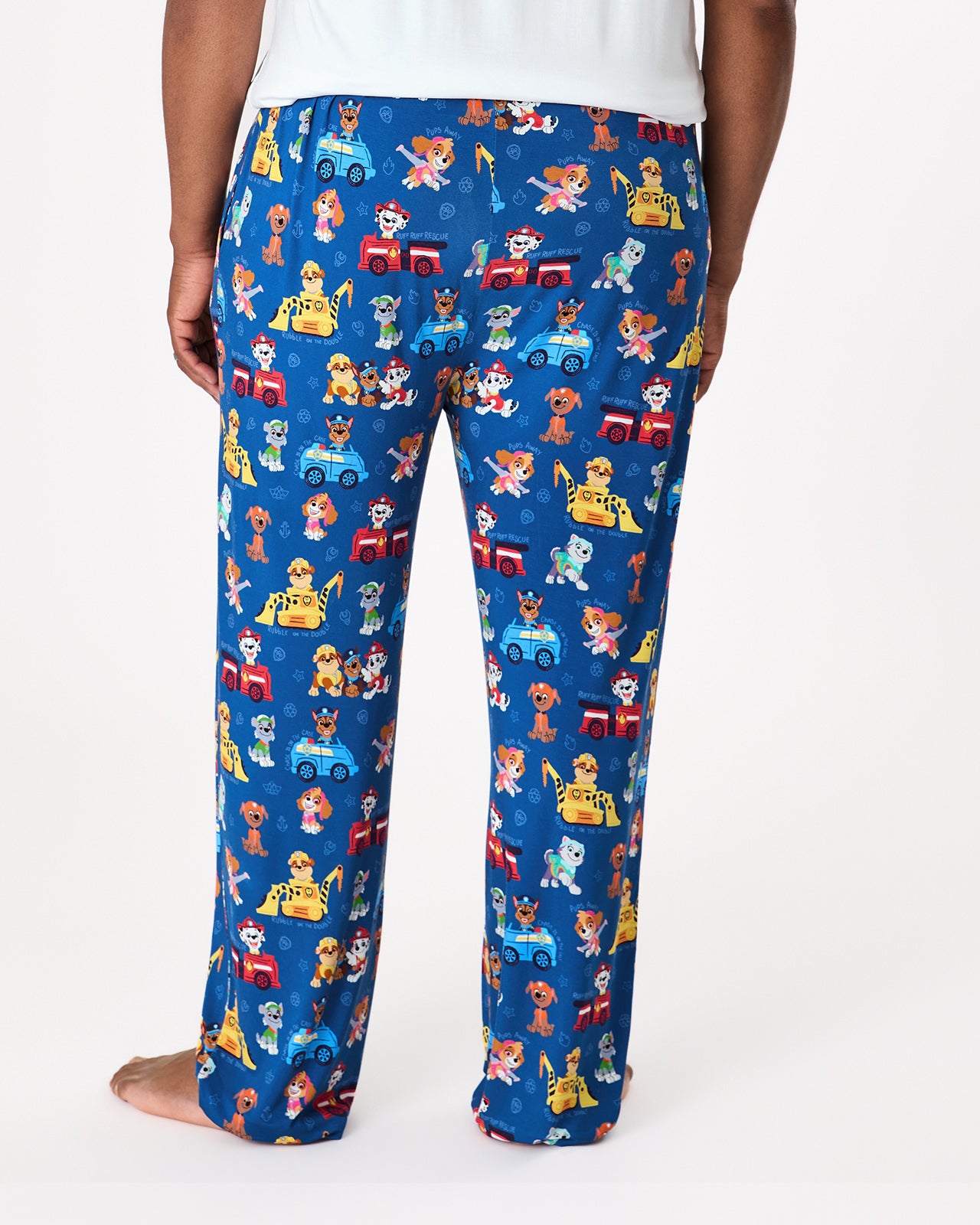 Back view of man wearing the PAW Patrol Adventure Bay Heroes Men's Pajama Pants