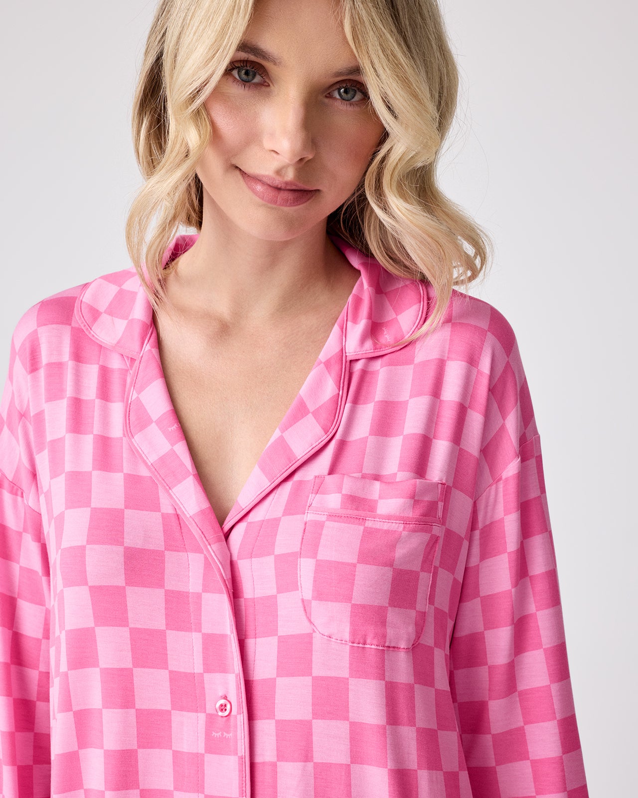 Close up of woman wearing the Sweet Raspberry Checks Women's Sleep Shirt